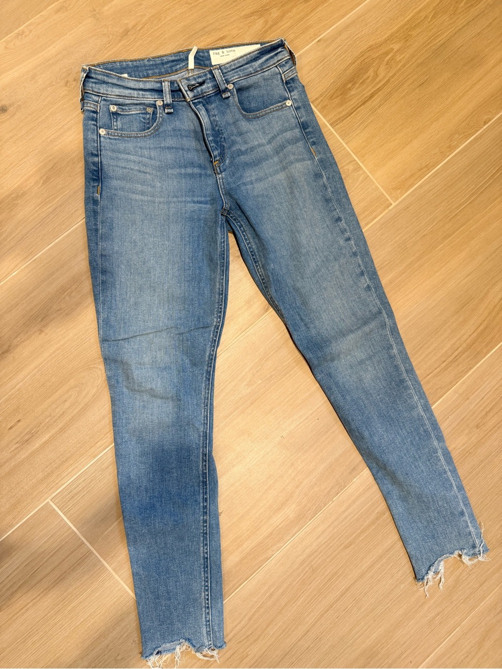 rag & bone light blue skinny jeans with raw hem